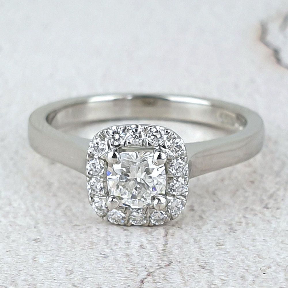 halo engagement ring with a cushion shaped diamond Platinum Halo engagement ring with cushion diamond