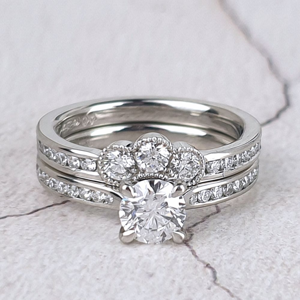 Customer's engagement ring with a fitted wedding ring Customer's engagement ring with a bespoke fitted wedding ring