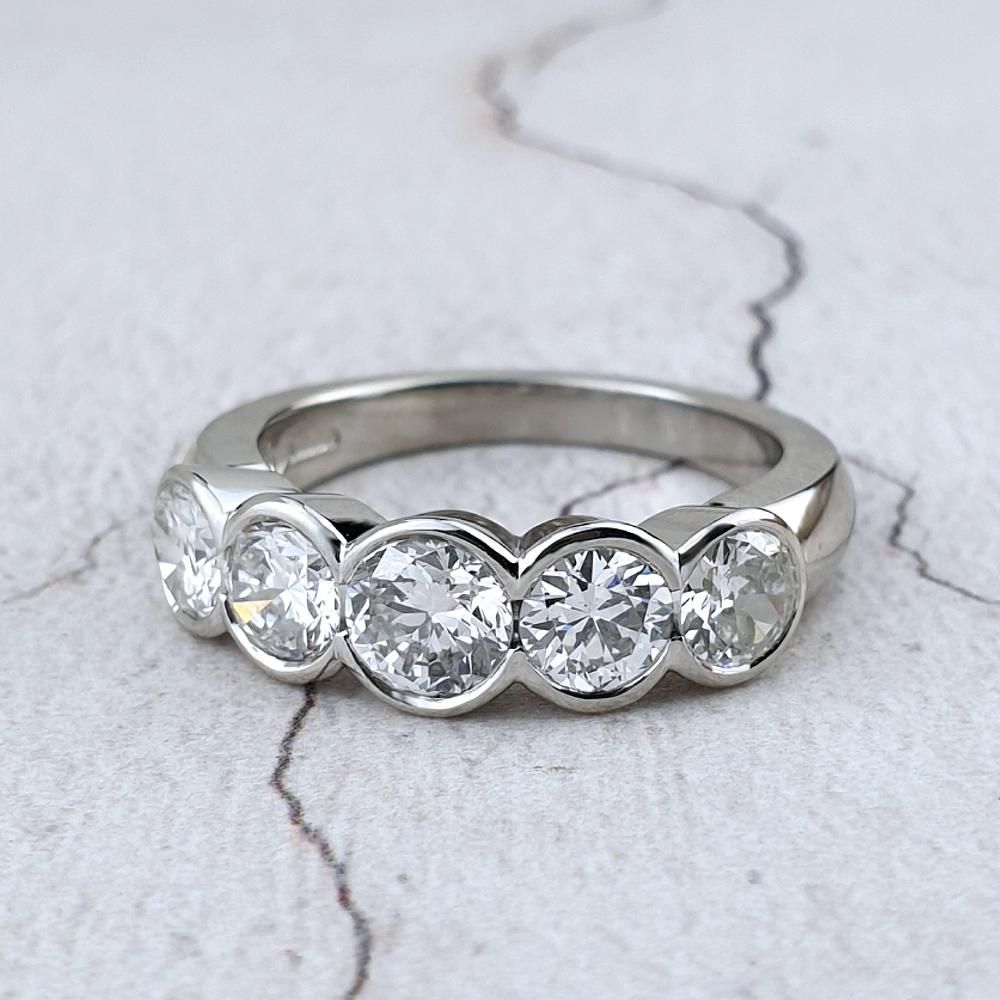 Platinum ring with a line of five diamonds