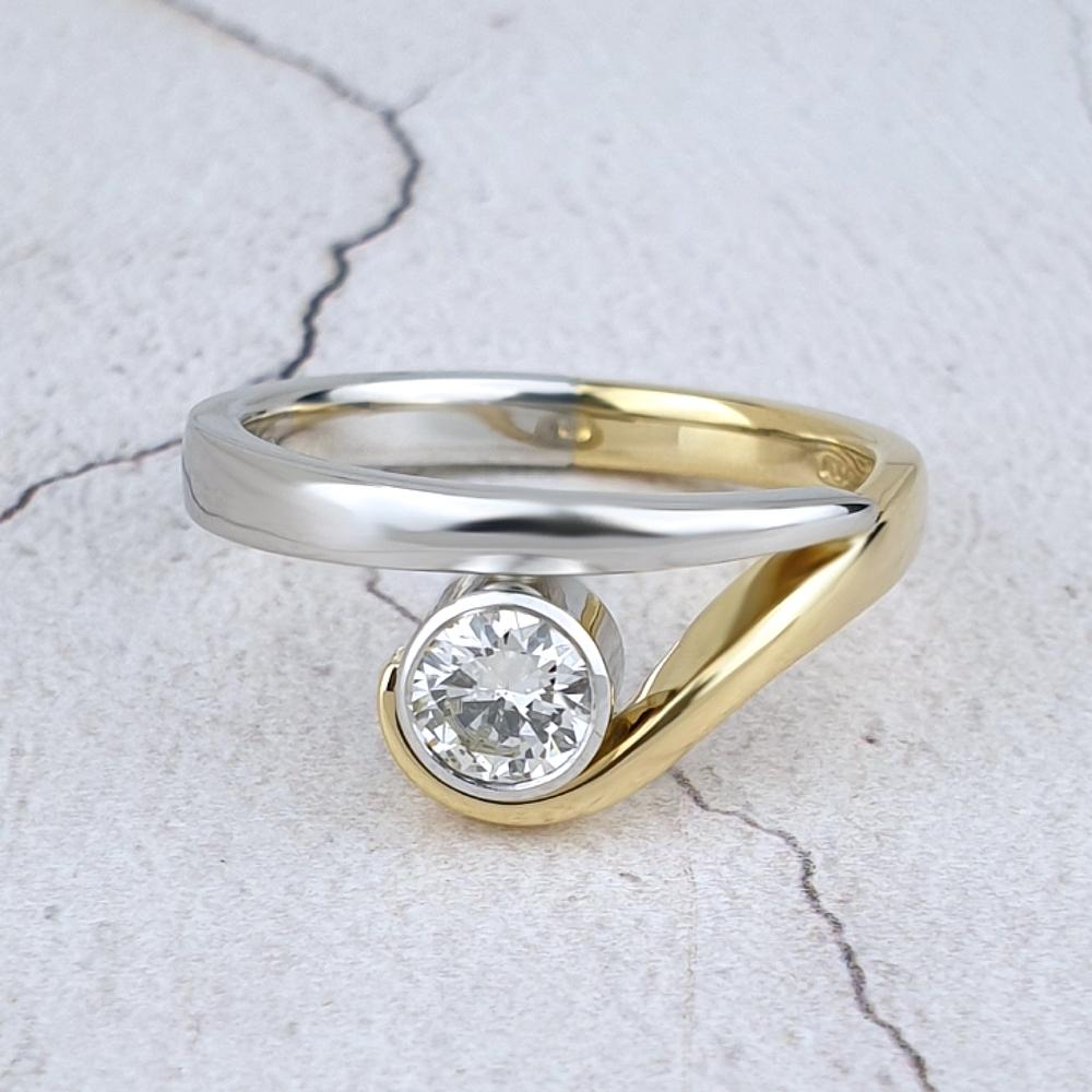 Platinum and yellow gold Curl engagement ring