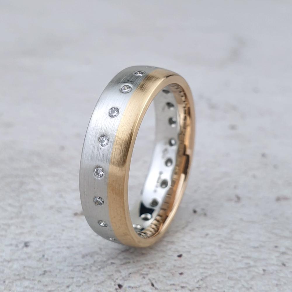 Matte platinum and gold man's ring with diamonds