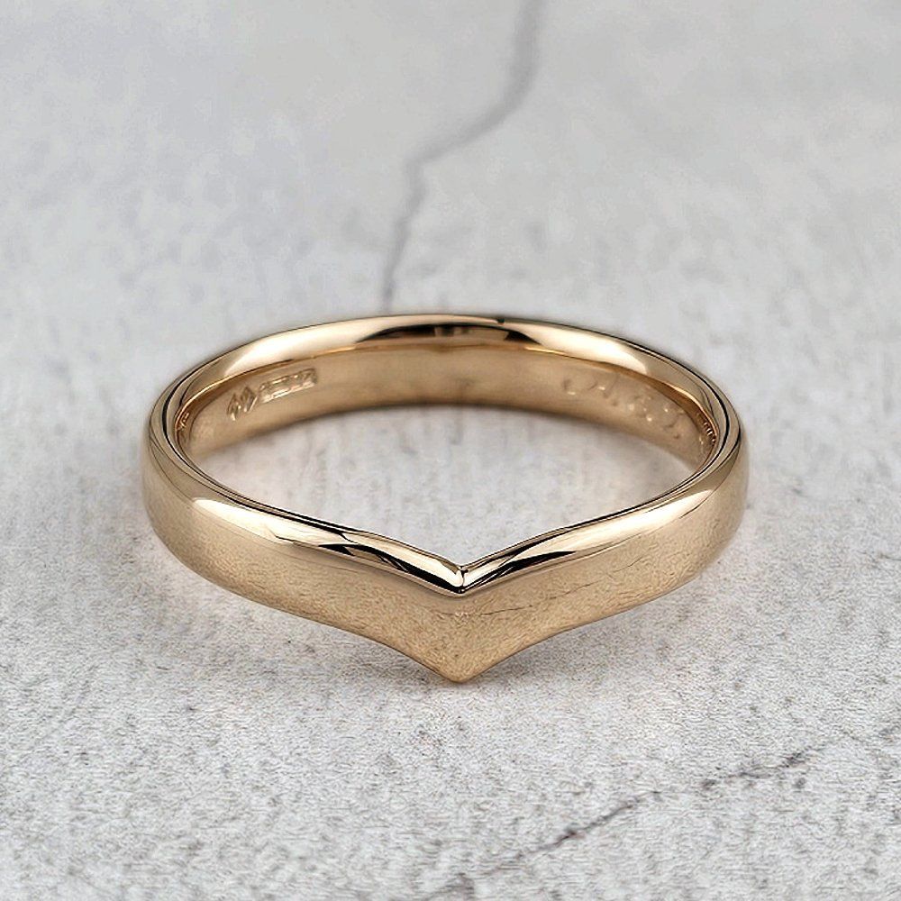 A man's wishbone wedding band