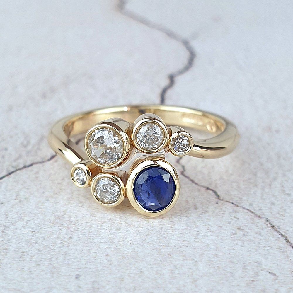 A remodelled 3-stone diamond ring Three old diamonds in a new setting