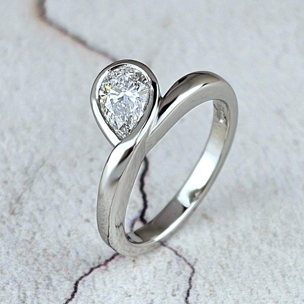 Infinity engagement ring with a pear shape diamond
