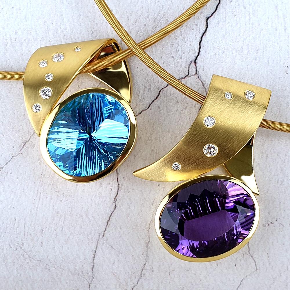 Unique pendants with blue topaz, amethyst, and diamonds Unique pendants with blue topaz, amethyst, and diamonds