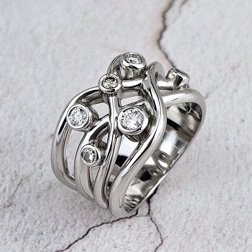 platinum entwined ring with small diamonds