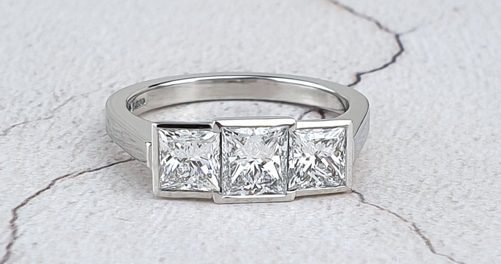 A three stone diamond engagement ring