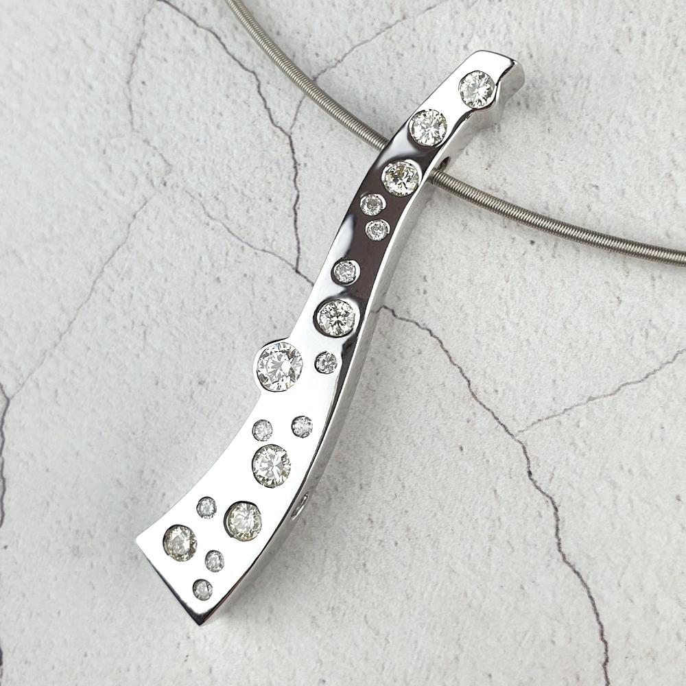 Reversible diamond pendant worn the other way