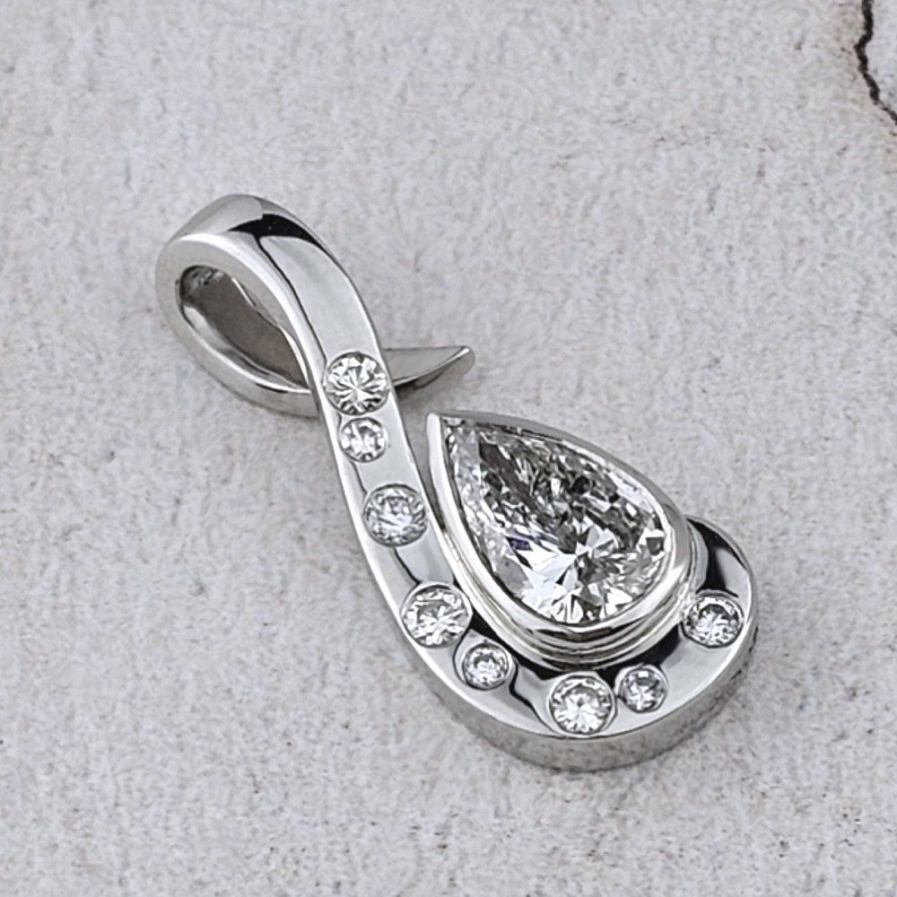 platinum pendant with a pear-shape d