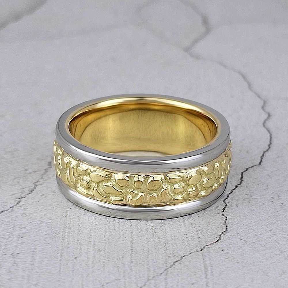 A man's wedding ring with textured gold centre and polished platinum outer bands