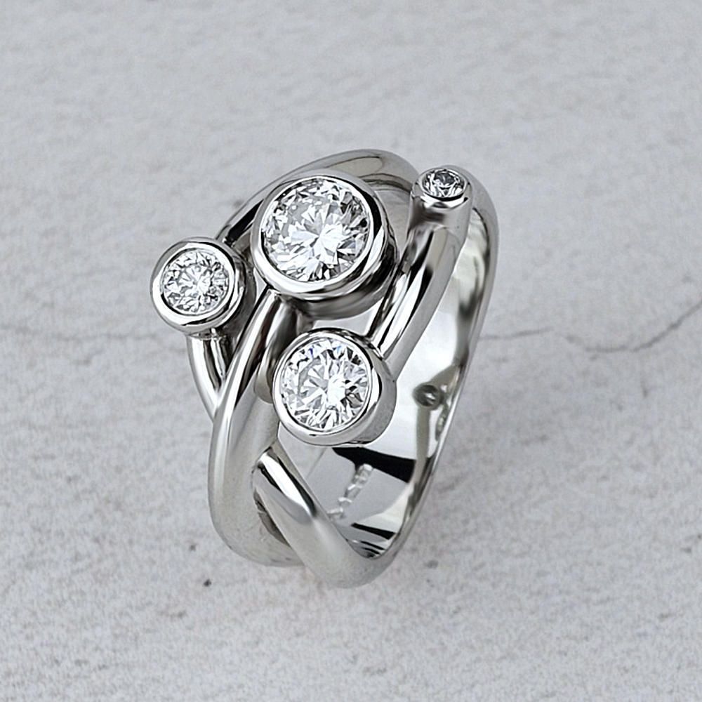 A remodelled 4-stone diamond ring Four old diamonds in a new setting