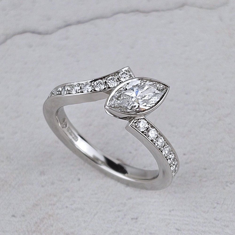 platinum engagement ring with marquise diamond