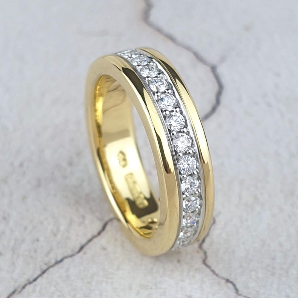 18ct gold and platinum wedding ring with diamonds