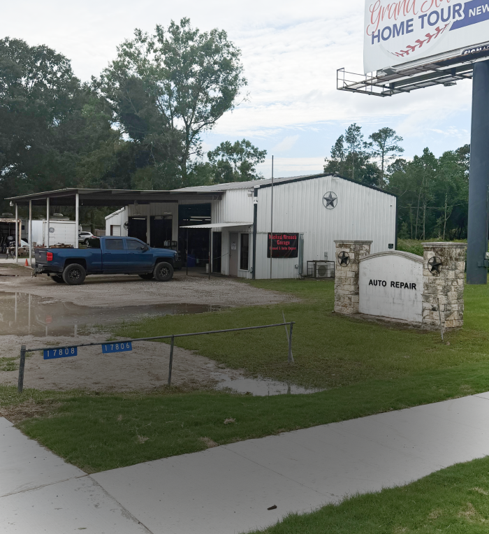 Blue car parked in front | The Wicked Wrench Garage