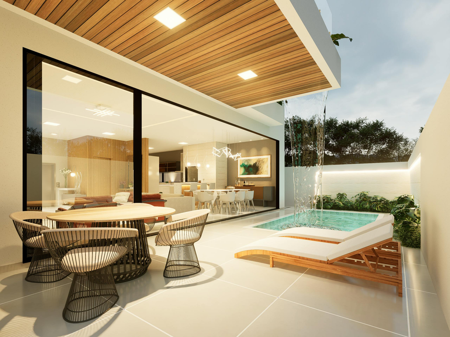 A modern patio with a round dining table, wicker chairs, a small pool, and a lounge chair under a wood-paneled ceiling.