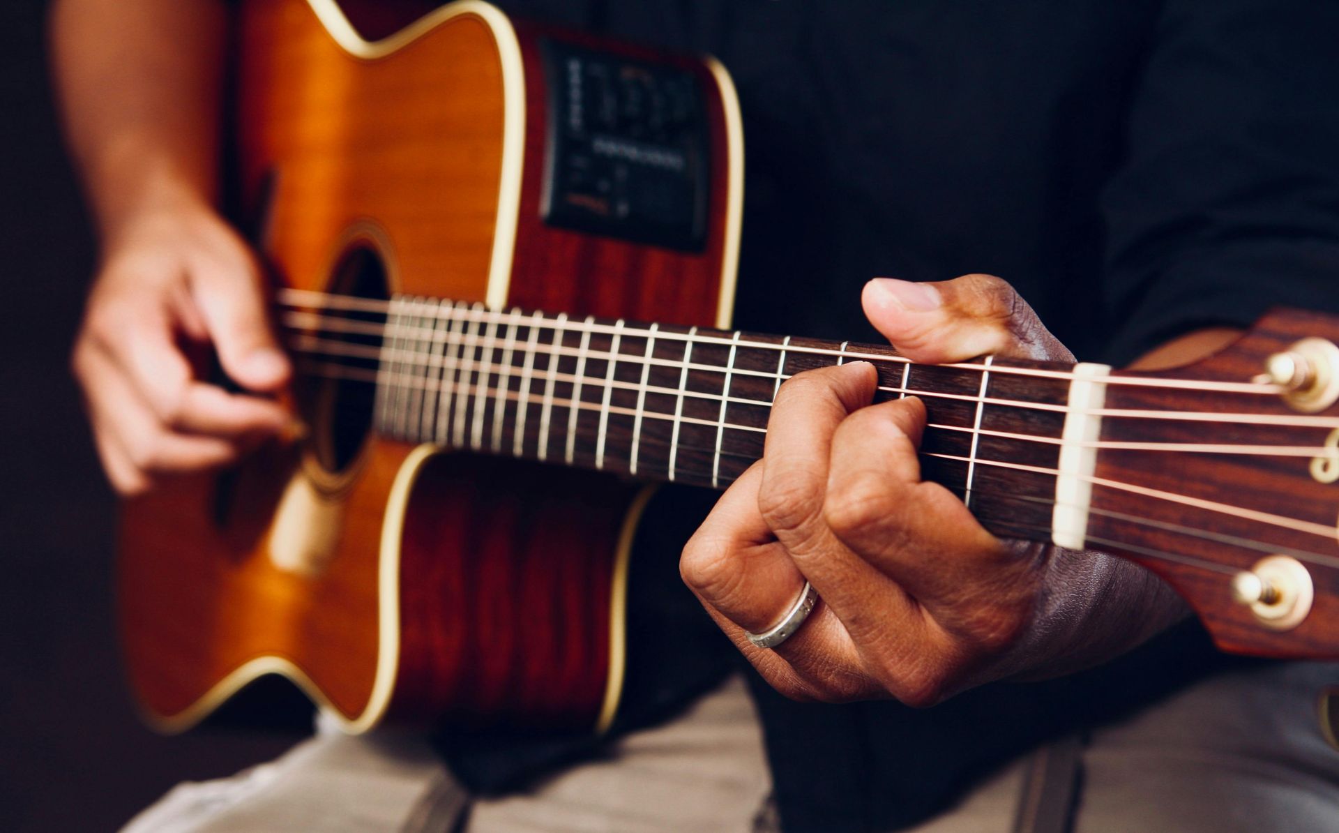 man playing guitar