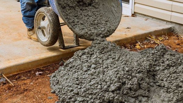 Man Pouring Concrete