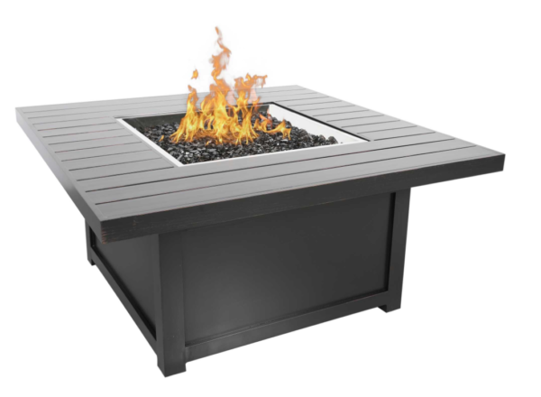 Modern square outdoor fire pit table with flames in the center and a gray slatted top