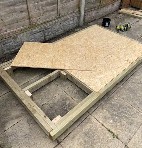 Treated timber base for shed