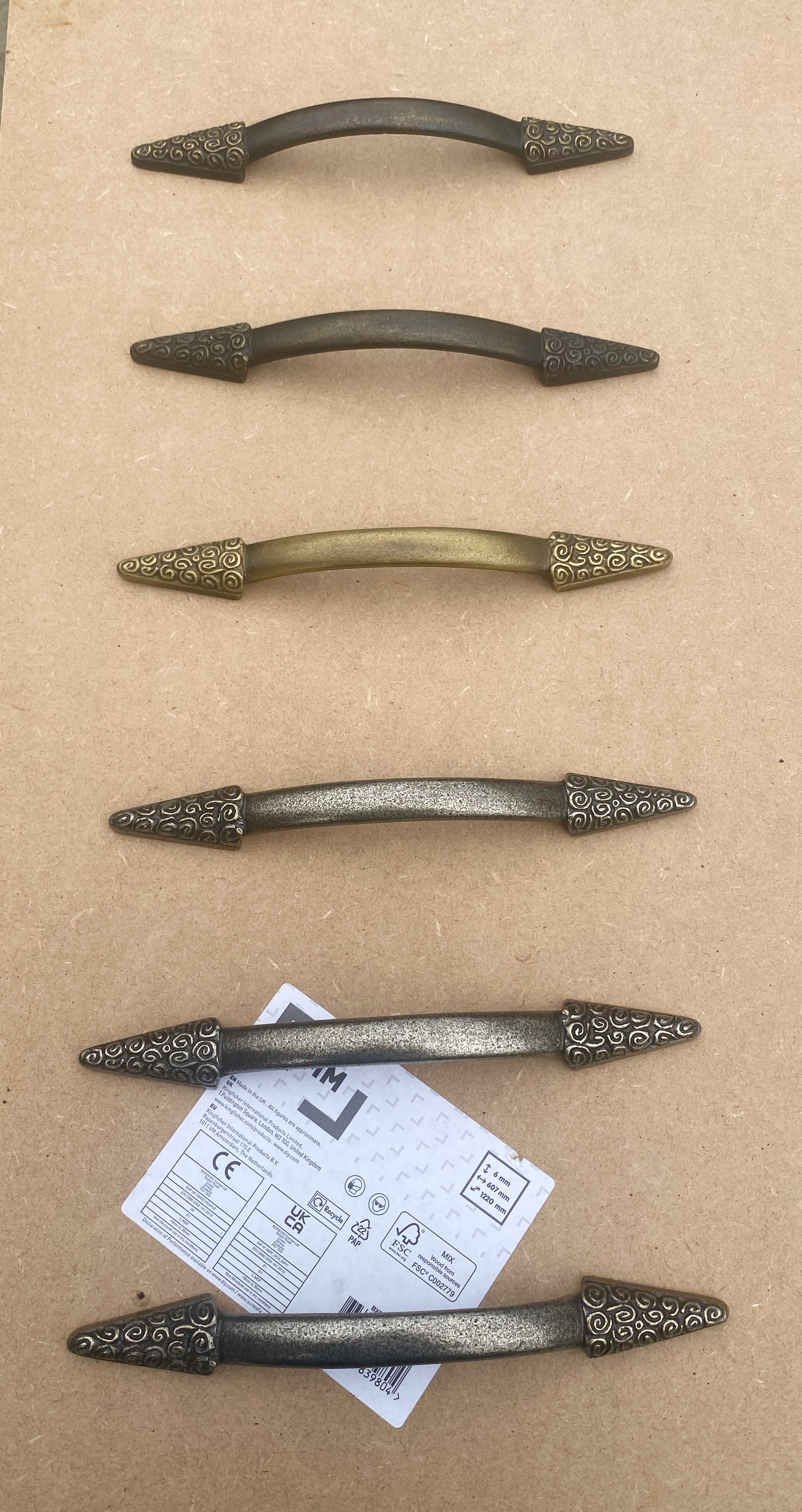 Challenge of six mismatching metal handles.
