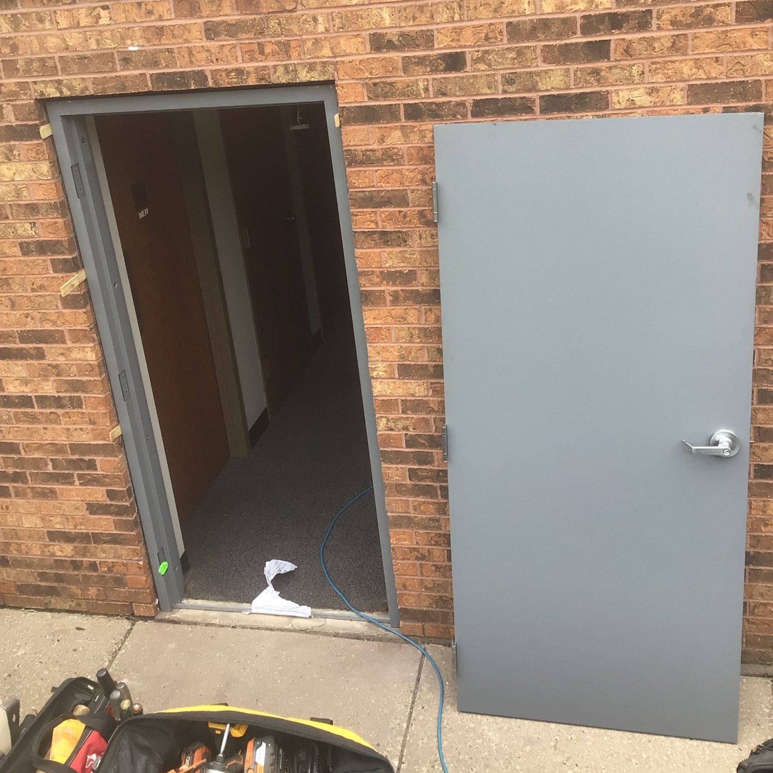 Man Restoring Door | Middleton, WI | Access Door & More Man Restoring Door | Middleton, WI | Access Door & More