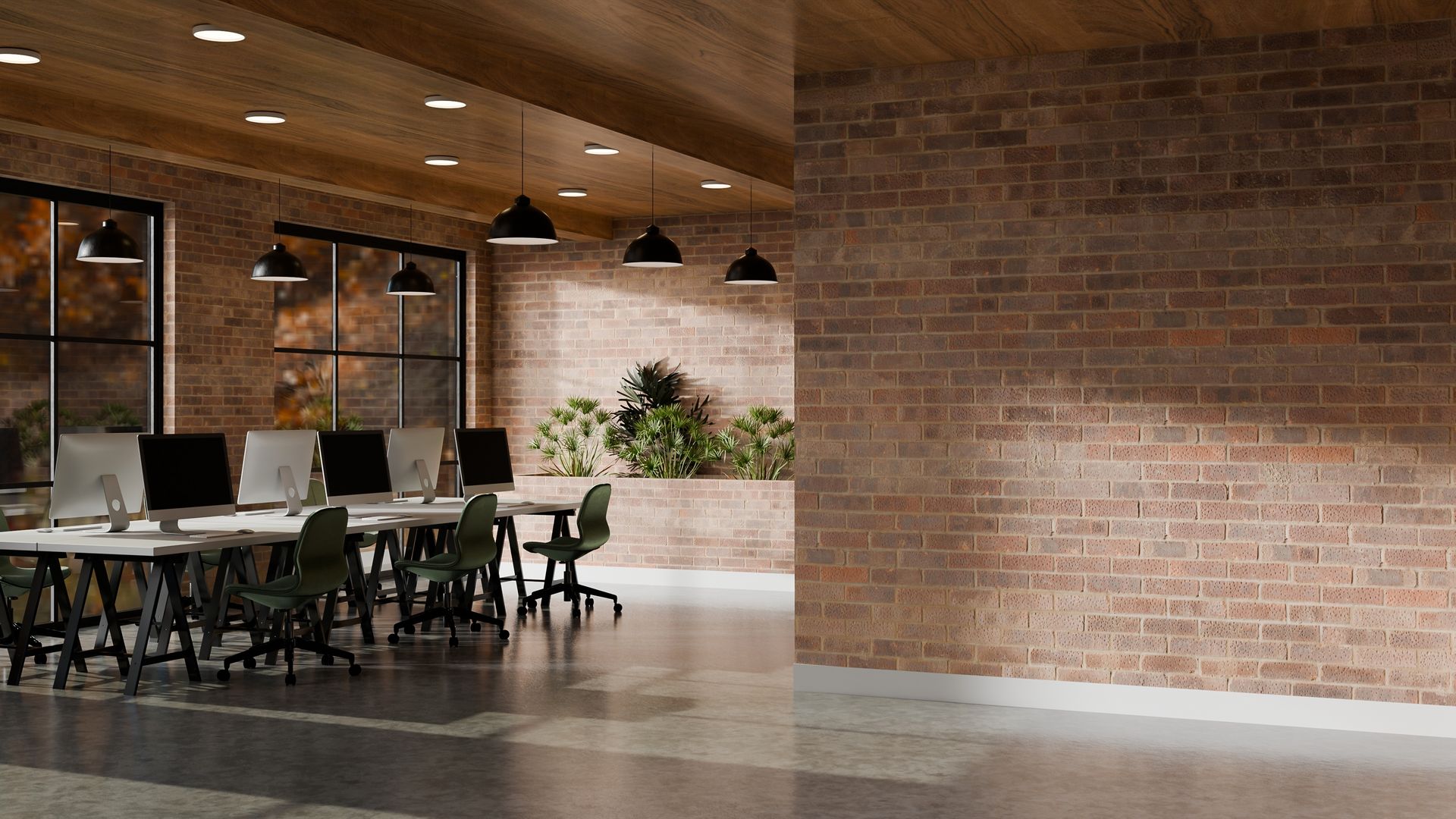 Empty brick-walled office lounge with tables, chairs, pendant lights, and a wooden ceiling