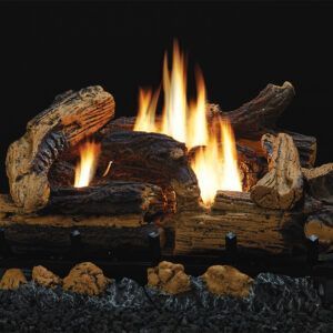 Glowing fire burning in a dark fireplace with black logs and stone hearth
