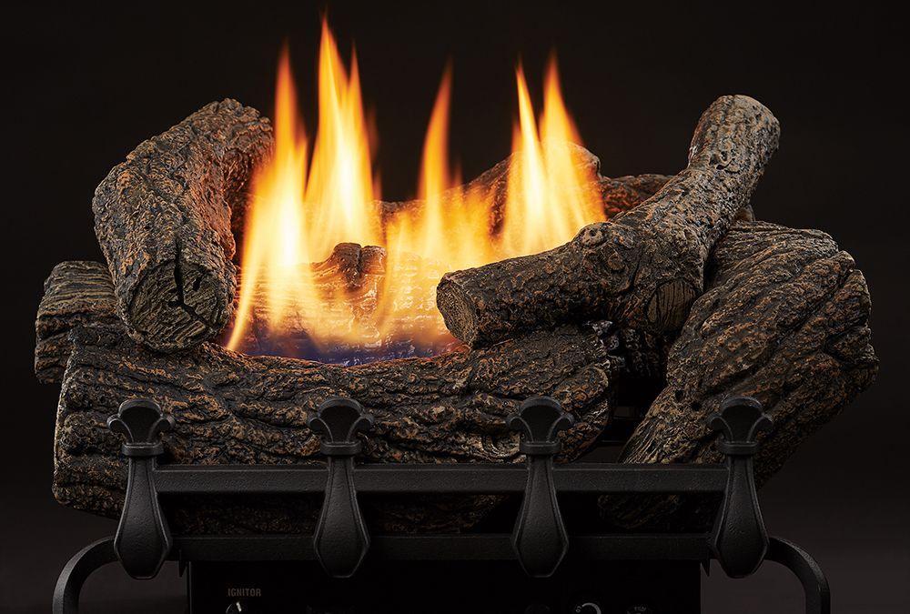Gas log fireplace insert with bright flames and glowing embers