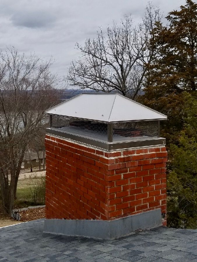 Brick Chimney With Metal Cap