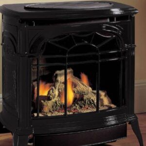 Black cast-iron wood stove with a fire burning inside