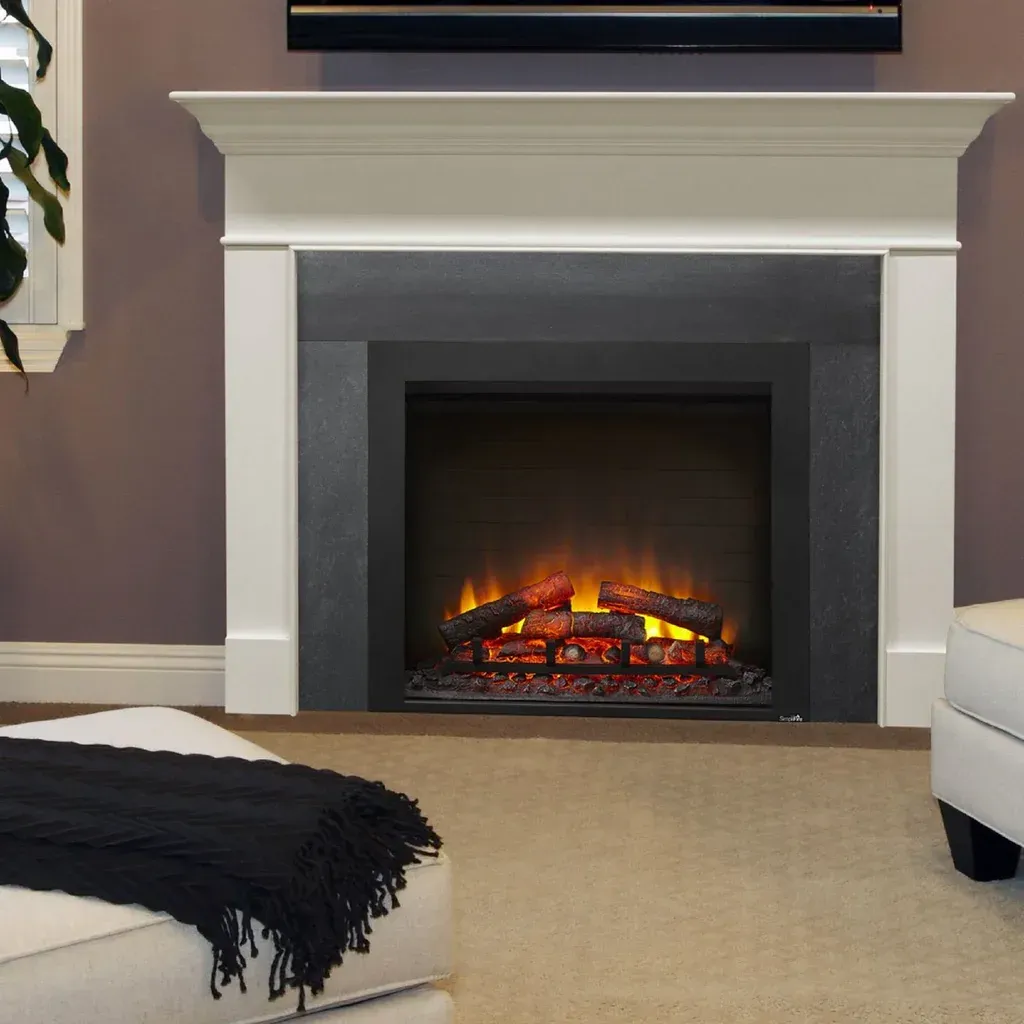Cozy living room with a modern white fireplace glowing with orange flames and beige carpet nearby