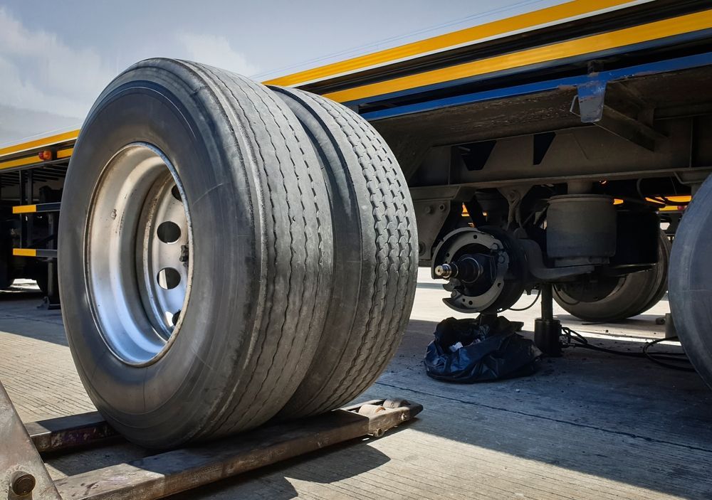 A Truck With a Broken Wheel is Being Repaired — Marx Forster Tyres & Mechanical In Forster, NSW