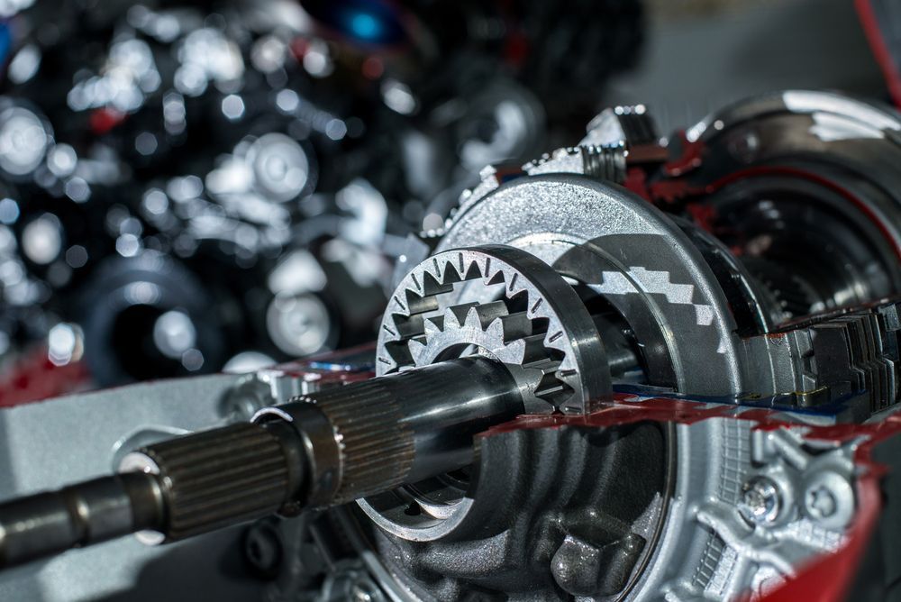 A Close Up of a Gearbox With a Lot of Gears on It — Marx Forster Tyres & Mechanical In Forster, NSW
