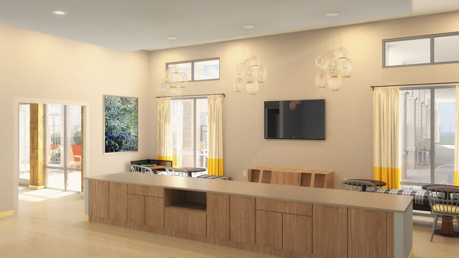 Bright modern kitchen with a large wooden island, beige walls, windows, and a wall-mounted TV.