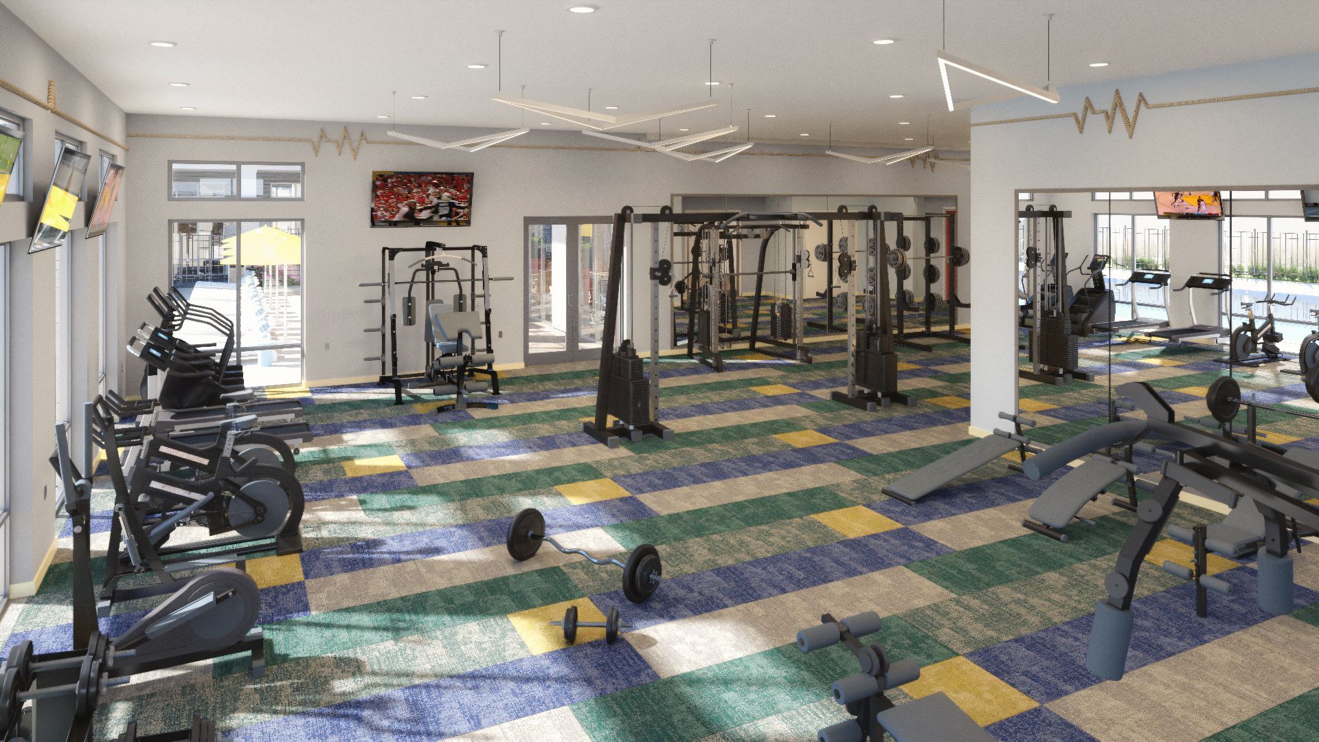 Gym interior with exercise machines, weights, and colorful carpet tiles under bright lights