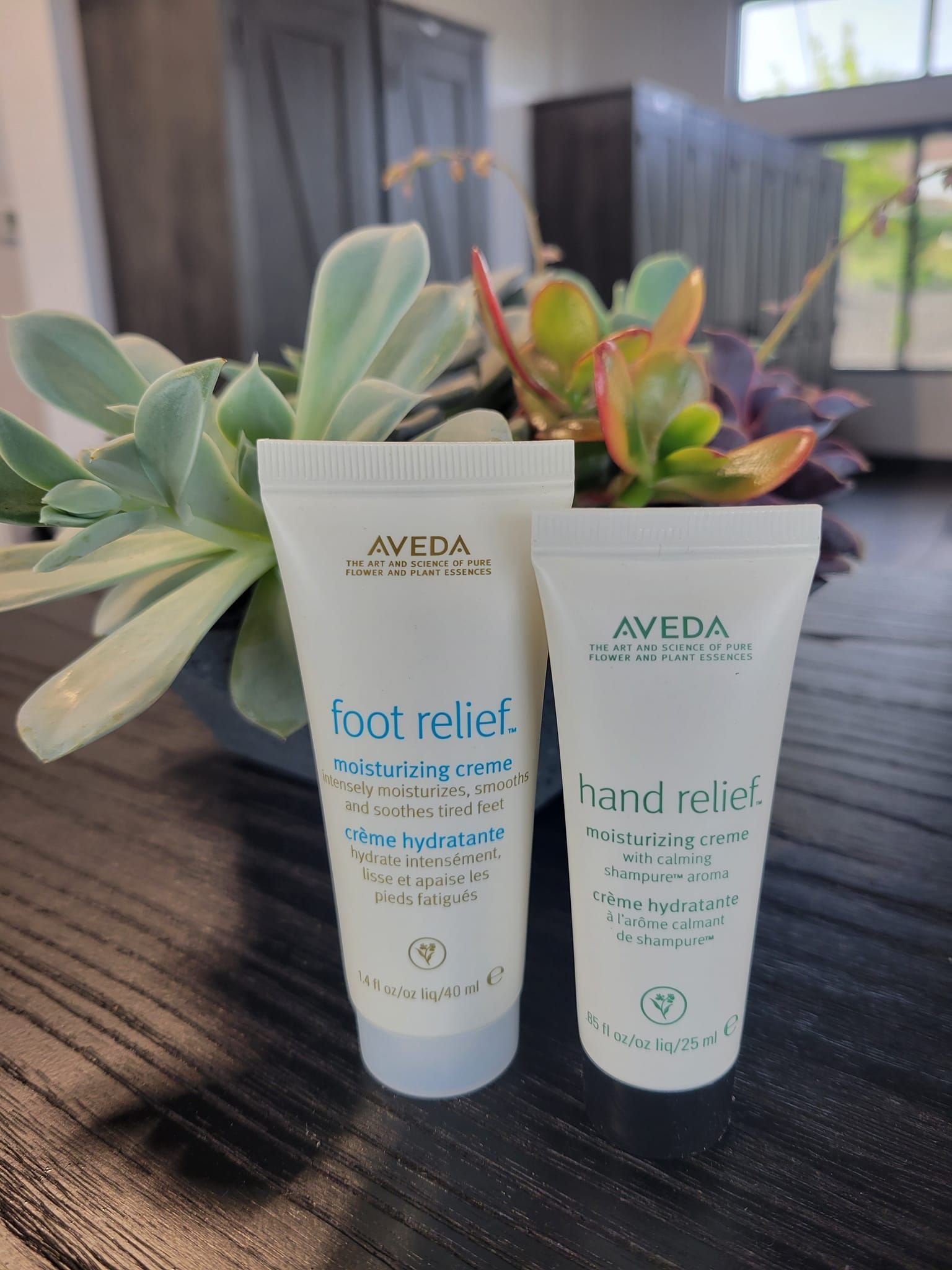 Two Aveda tubes, labeled 