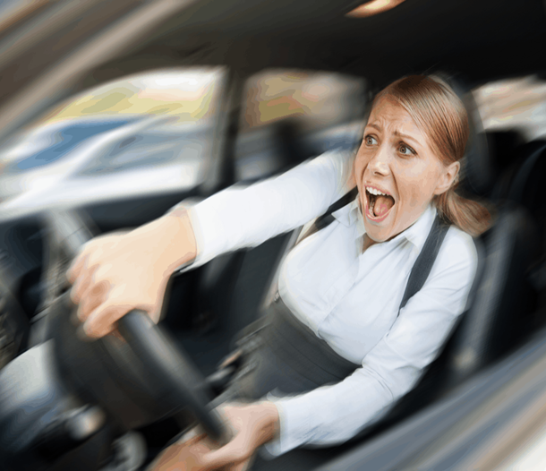 Woman inside car, panicked expression, hands gripping steering wheel, motion blur suggesting high speed.