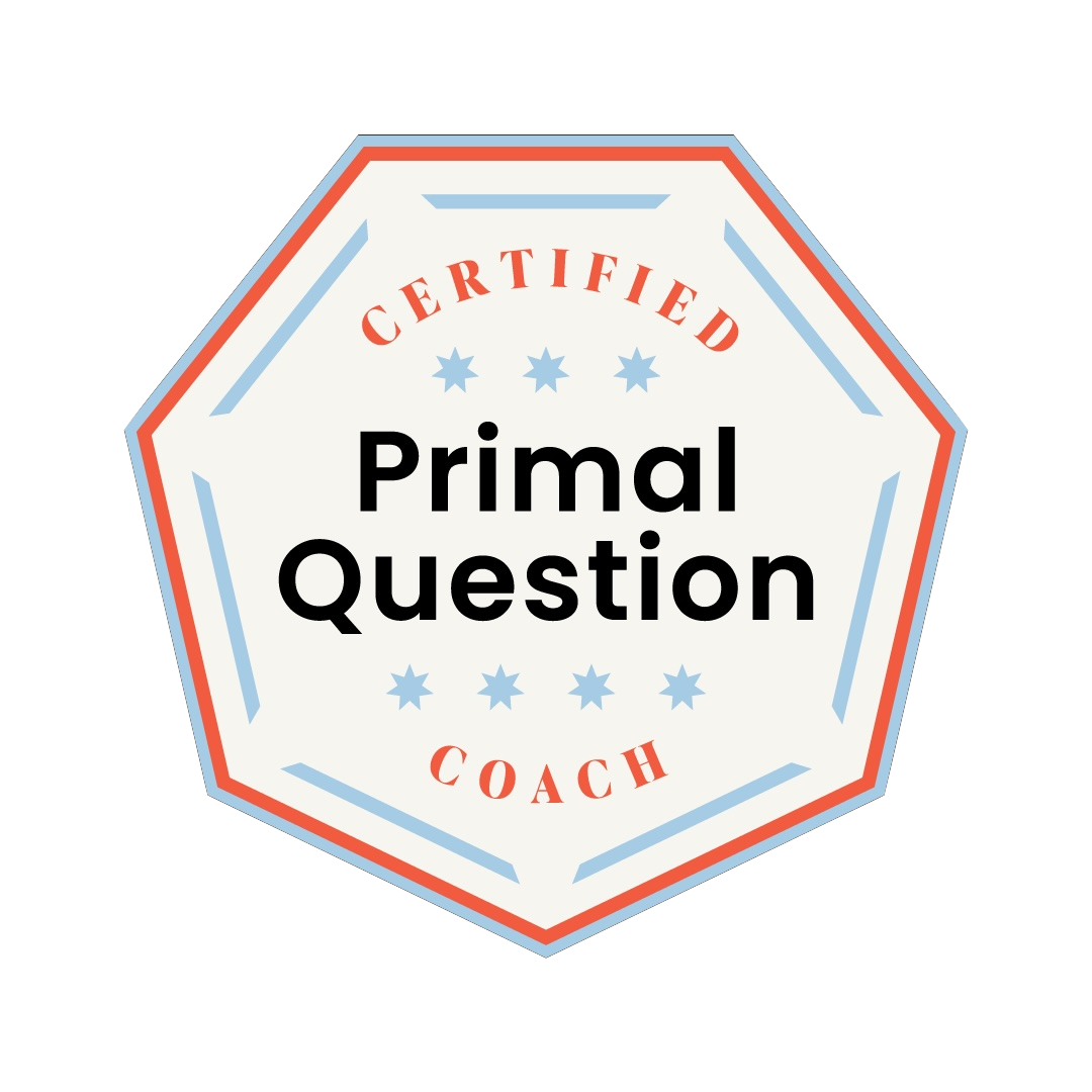 An octagonal badge with red and blue borders reading 