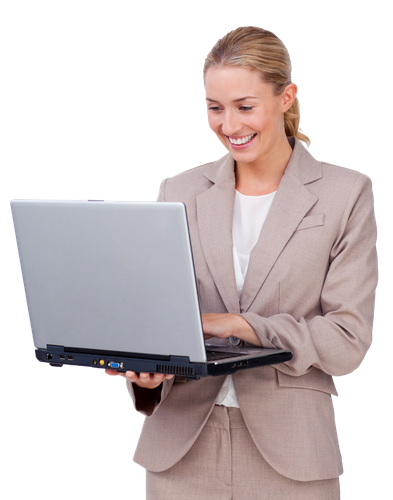 A woman in a suit is smiling while holding a laptop