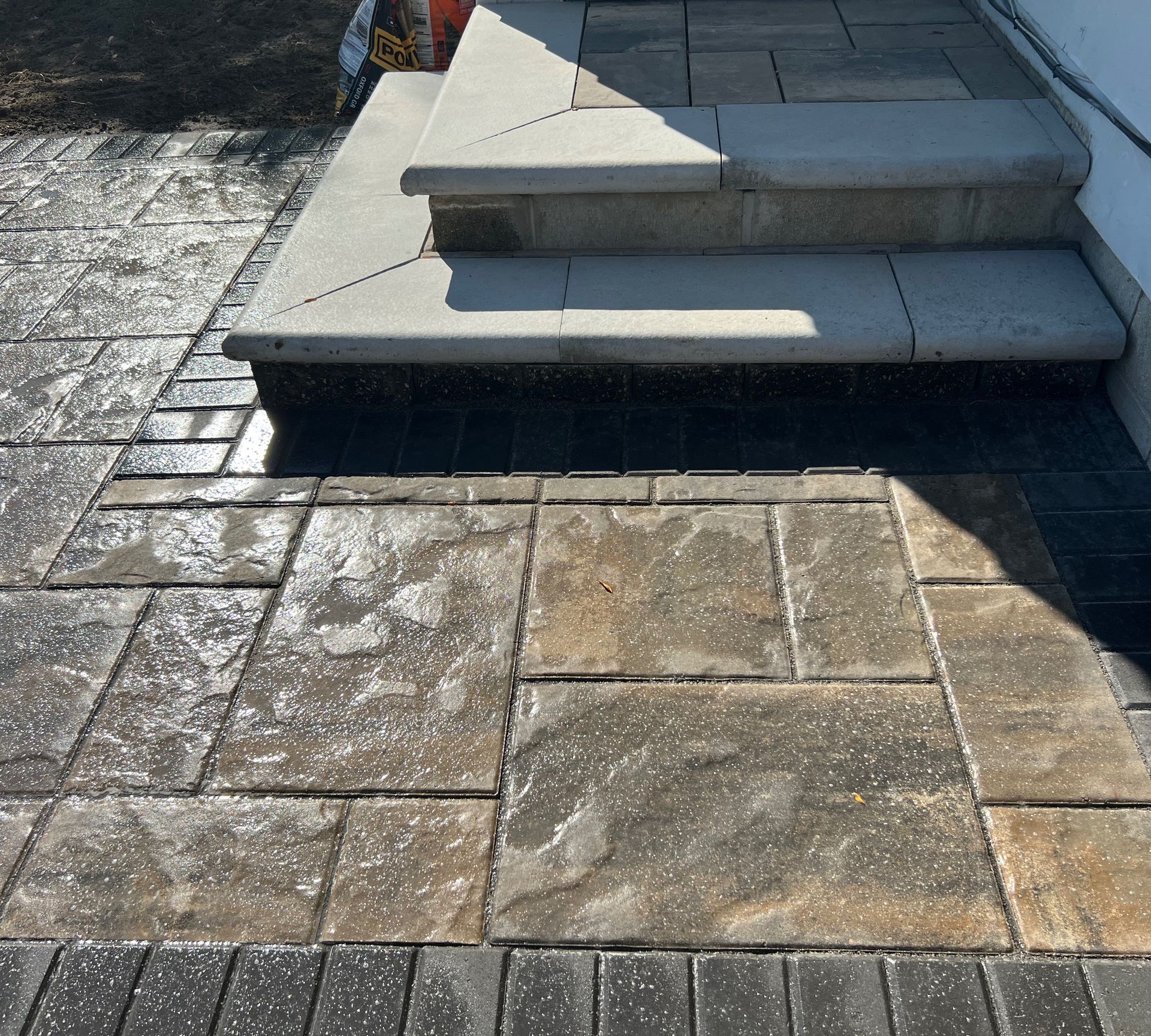 Stone steps and walkway leading to a building entrance.