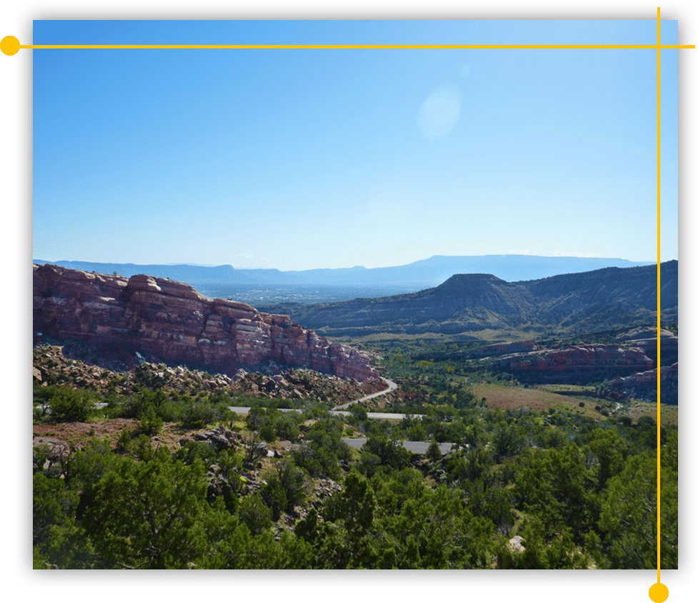 A picture of a valley with mountains in Western Colorado
