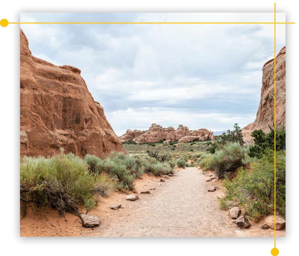 A dirt road going through a canyon in Moab, UT A dirt road going through a canyon in Moab, UT