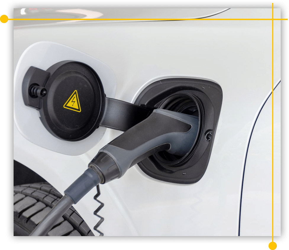 A close up of an electric car being charged A close up of an electric car being charged