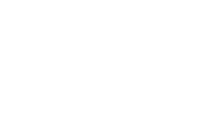 A colorful, multi-layered mandala art piece with intricate geometric patterns and a central star shape.