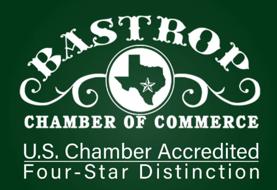 Bastrop Chamber of Commerce logo, green background, white text.  Texas outline with star, 