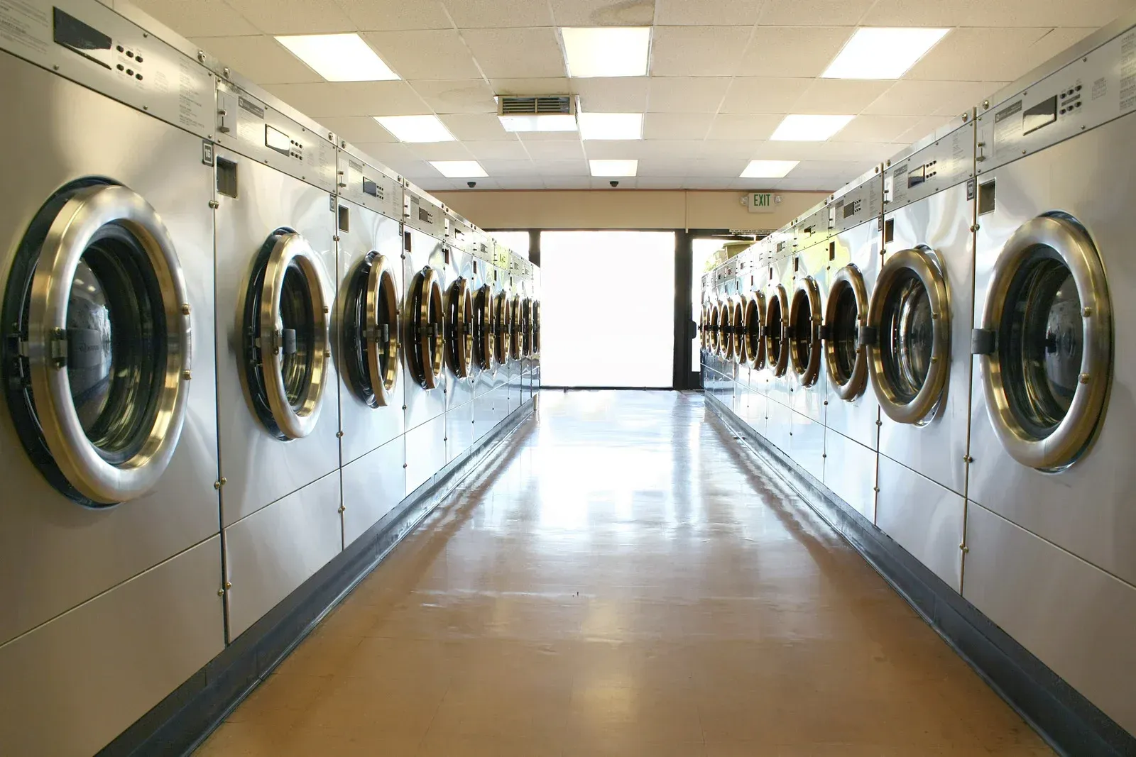 A row of washing machines in a laundromat