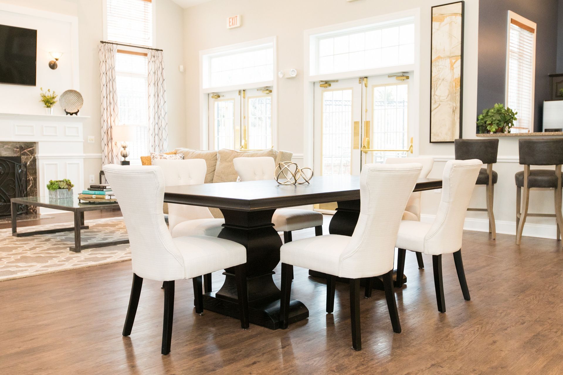 Community seating area and table at Park Station Apartments.