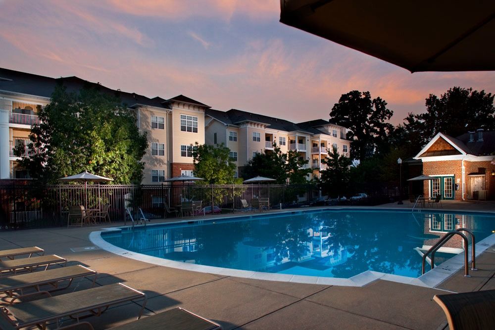Swimming pool at night at Park Station Apartments.