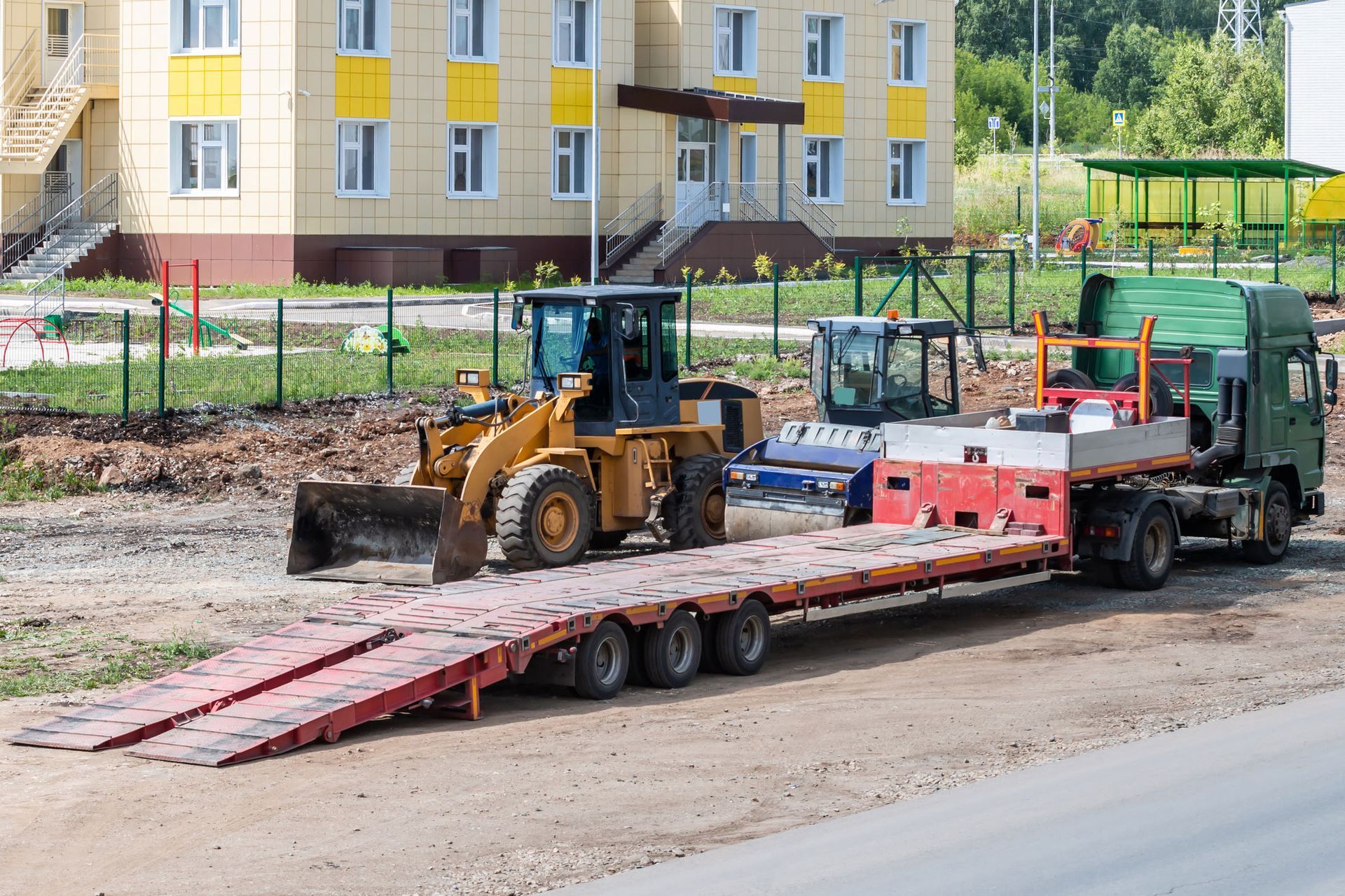 Truck With Low Loader — Tonasket, WA — Will Logging & Construction LLC