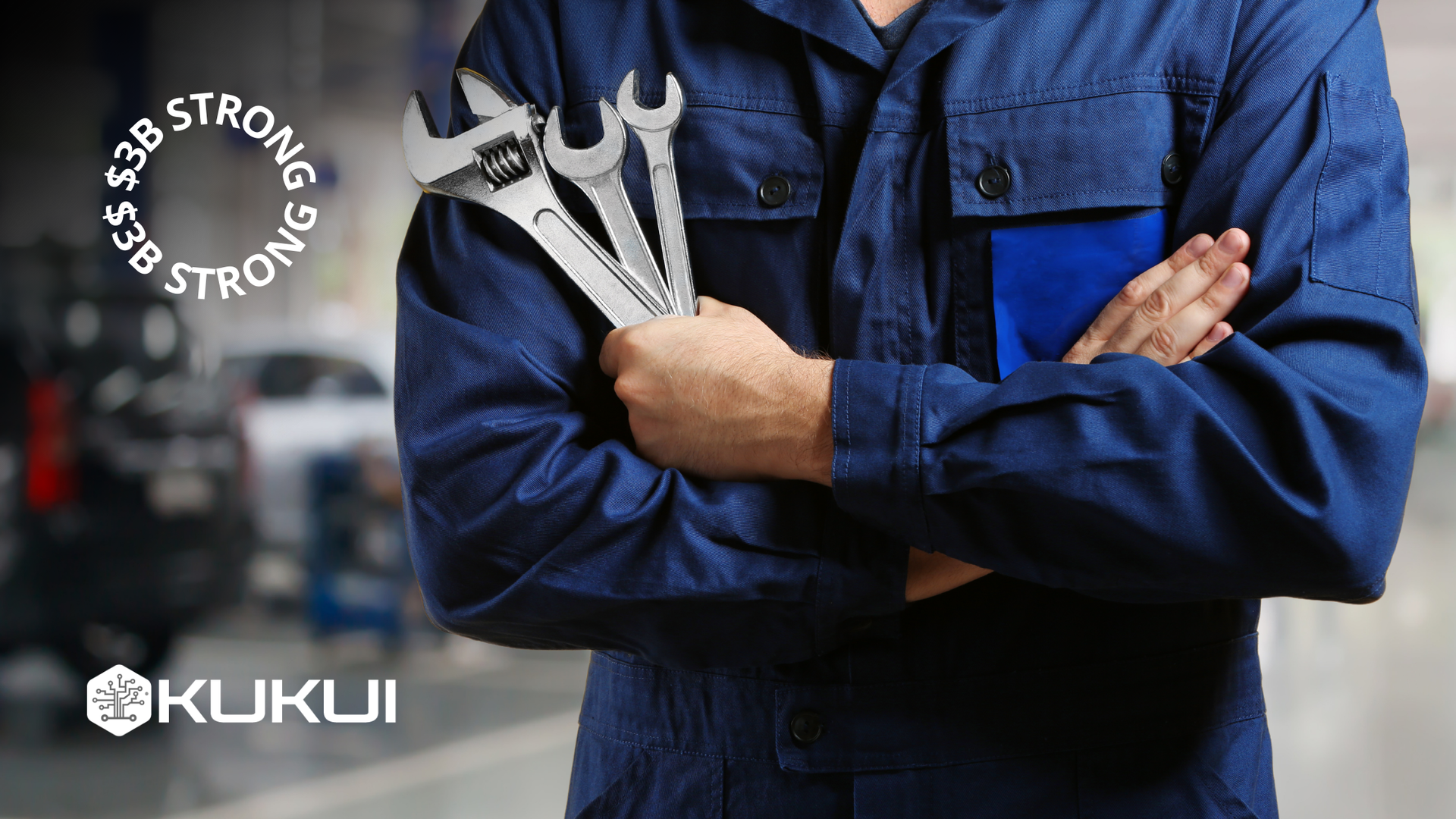Mechanic holding wrenches, wearing blue uniform. Workshop setting. Text: Kukui, $3B Strong.